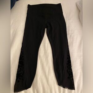 Beautiful Limited Edition Athleta leggings with  insert velvet rose pattern.